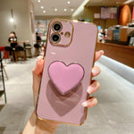 Electroplating Love Heart Holder TPU Phone Case, For iPhone 17e / 16e, For iPhone 17 Pro Max, For iPhone 17 Pro, For iPhone 17, For iPhone Air, For iPhone 16 Pro Max, For iPhone 16 Pro, For iPhone 16 Plus