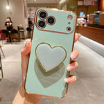Electroplating Love Heart Holder TPU Phone Case, For iPhone 17e / 16e, For iPhone 17 Pro Max, For iPhone 17 Pro, For iPhone 17, For iPhone Air, For iPhone 16 Pro Max, For iPhone 16 Pro, For iPhone 16 Plus