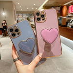 Electroplating Love Heart Holder TPU Phone Case, For iPhone 17e / 16e, For iPhone 17 Pro Max, For iPhone 17 Pro, For iPhone 17, For iPhone Air, For iPhone 16 Pro Max, For iPhone 16 Pro, For iPhone 16 Plus
