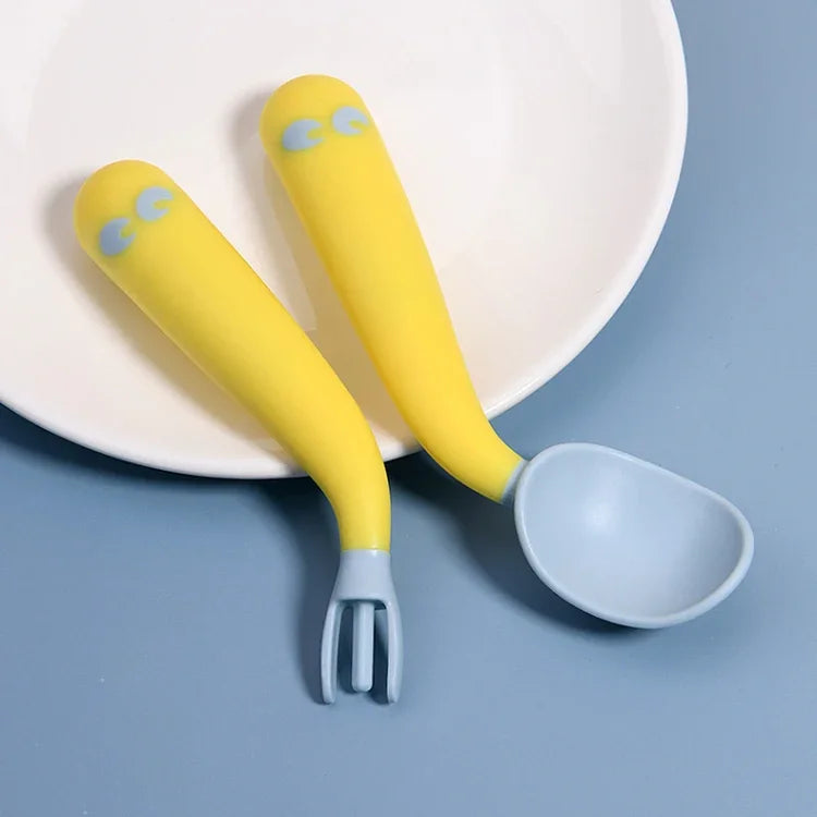 Baby Learning To Eat Bending Training Elbow Twisting Spoon Fork