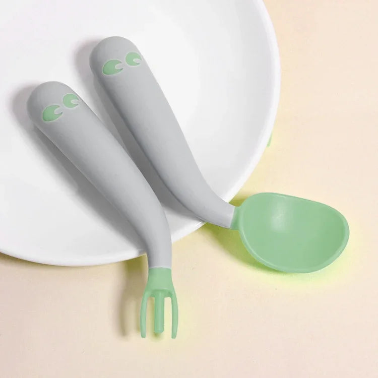 Baby Learning To Eat Bending Training Elbow Twisting Spoon Fork
